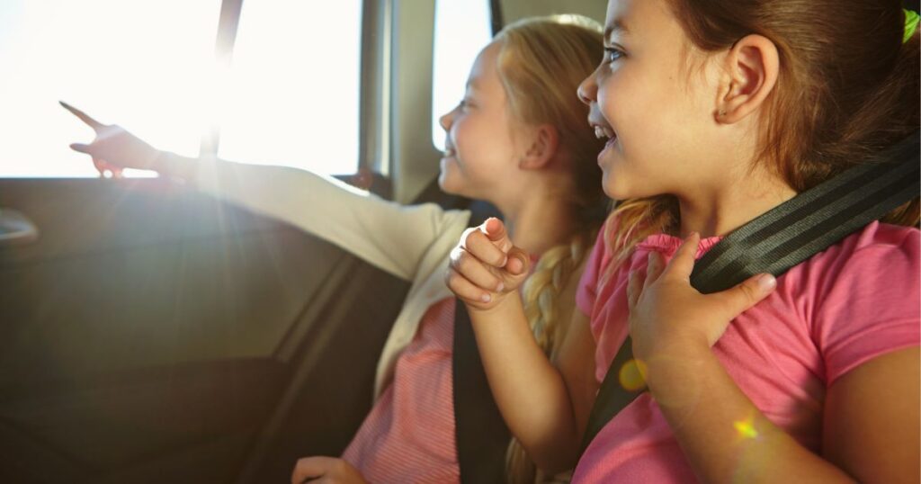 15 Screen-Free Car & Travel Activities for Long Summer Drives kids pointing out car window
